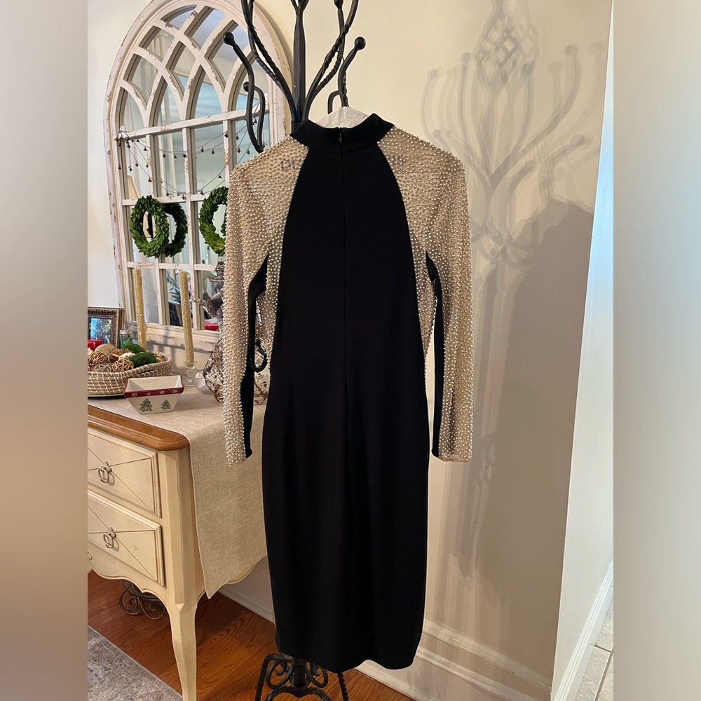 Evening dress by Avery G.